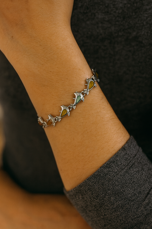 Front view of Ladies Dolphin Magnetic Bracelet with cat eye stones