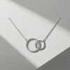 Close-up showing sparkling CZ stones on interlocking circles