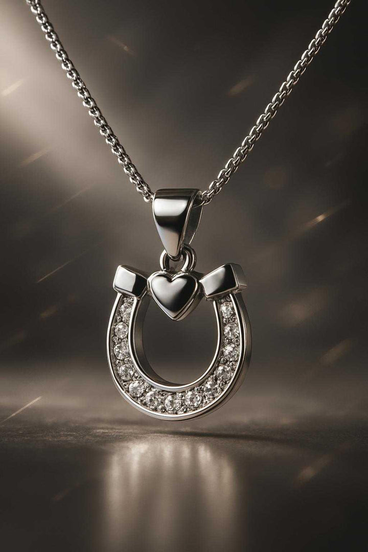 Side view of Silver CZ Lucky Horse Shoe & Heart Pendant showing cubic zirconia details
